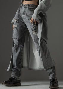 Distressed tapered denim pants