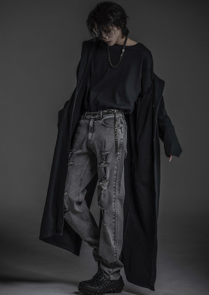 Distressed tapered denim pants