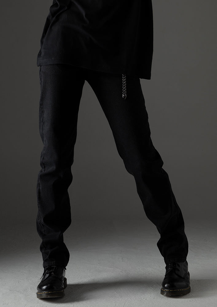 Distressed tapered denim pants